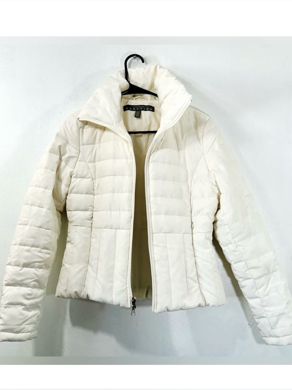 60% Down Kenneth Cole Reaction high neck zip up cream colored puffer.Size S